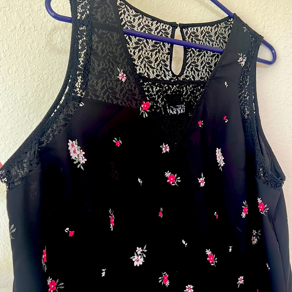 Black and pink floral blouse with lace.